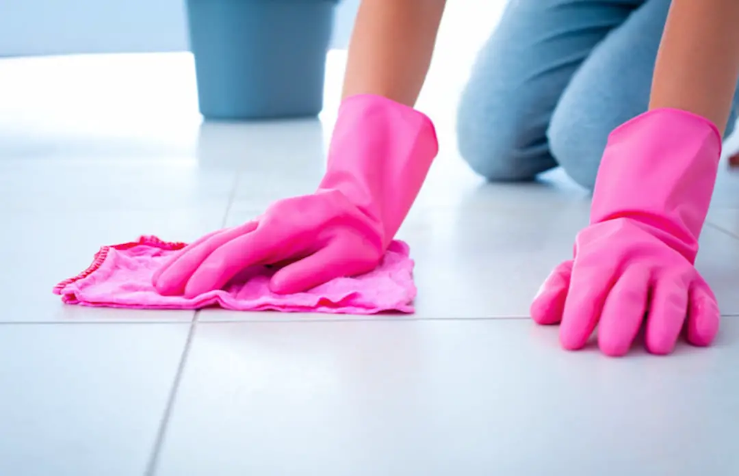 a person cleaning the floor